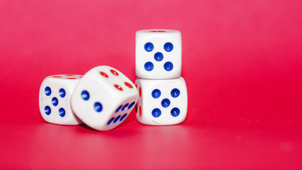 Dices with red background. Selected focus.