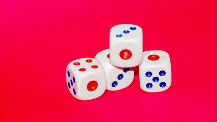Dices with red background. Selected focus.