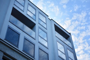 The windows of a modern building for offices. Business buildings architecture.