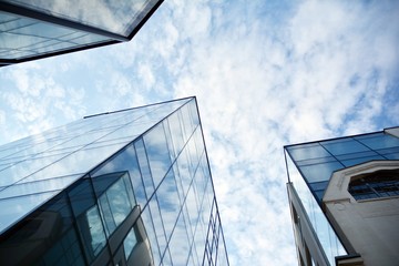 The windows of a modern building for offices. Business buildings architecture.