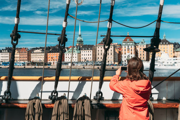 Stockholm, Sweden. Scenic View Of Embankment In Old Town Of Stockholm From Old Ship. Famous Gamla Stan In Summer Morning. Popular Destination Scenic Place And UNESCO World Heritage Site