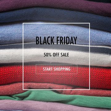 Stacks of folded clothes, close up . Black friday sale - Image