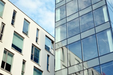 The windows of a modern building for offices. Business buildings architecture.