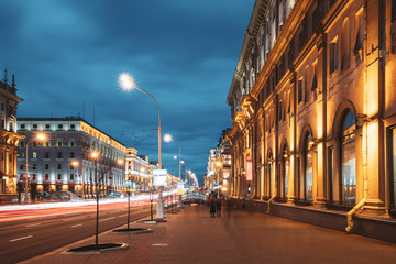 Minsk, Belarus. Traffic On Independence Avenue In Evening Night Illuminations