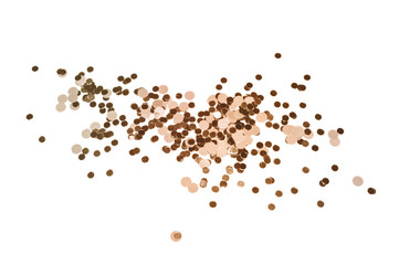 Gold glitter on white background, shiny confetti
