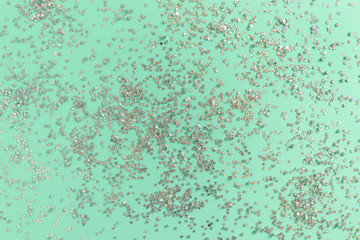 Texture made of silver glitter stars