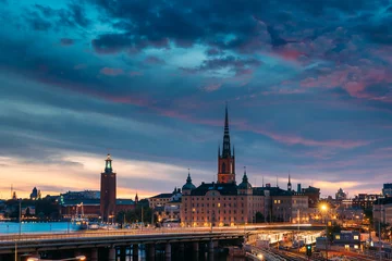 Foto op Canvas Stockholm, Sweden. Scenic View Of Stockholm Skyline At Summer Evening Night. Famous Popular Destination Scenic Place Under Dramatic Sky In Night Lights. Riddarholm Church, City Hall, Subway Railway © Grigory Bruev