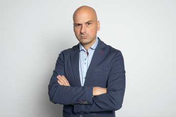 portrait of angry bald man isolated