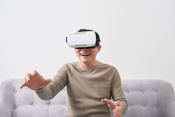 Man wears virtual reality glasses with smartphone inside. vr glasses virtual reality glass 3d cyberspace simulation concept