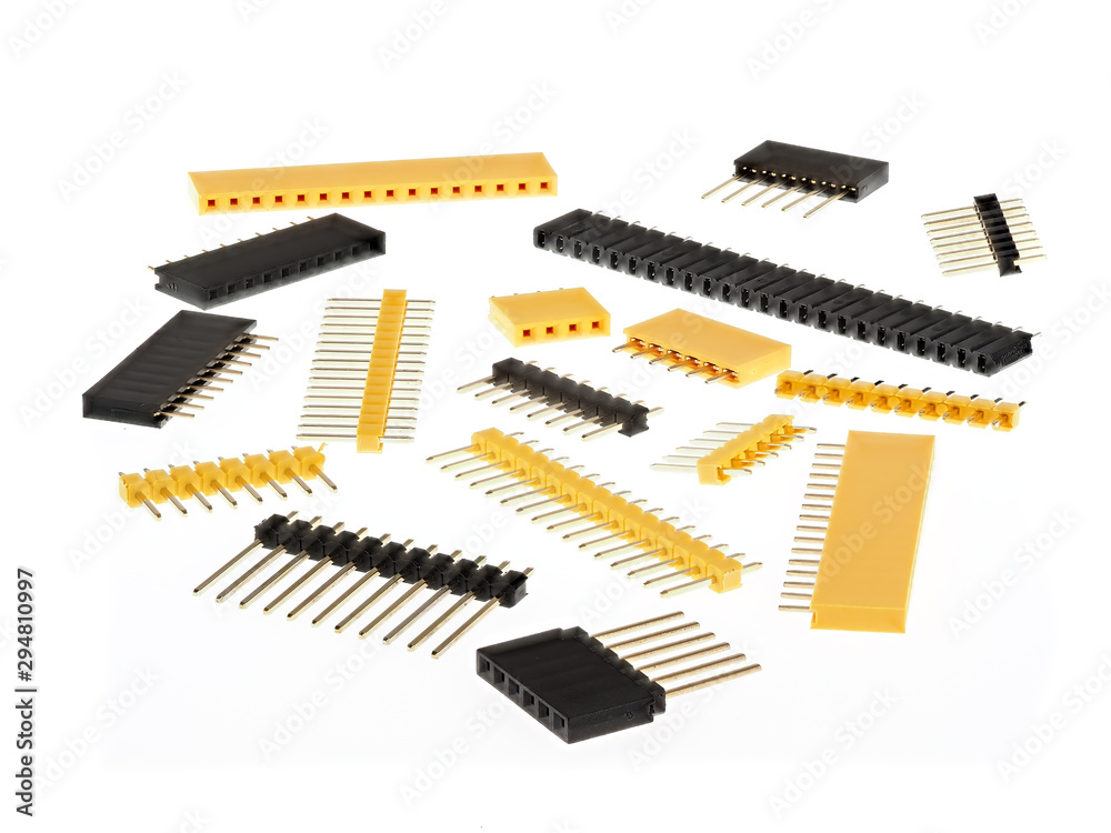 Wall mural macro shot of a group of 2.54mm single row female and male pin header connectors, isolated on white