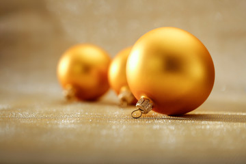 Christmas decorations in bright shiny colors with Christmas lights with blurred background.