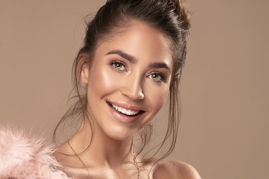 Portrait of smiling beauty young woman.