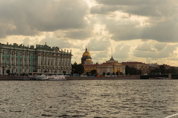 St. Petersburg, Russia, - August, 28, 2018. Dvortsovaya embankment, The Admiralty building, Saint Isaac's Cathedral and Hermitage museum. View from the pleasure craft. UNESCO World Heritage Site.
