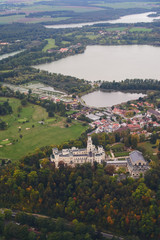 Fototapeta na wymiar View of the landscape from a sports plane on the Czech Republic, South Bohemia Castle and chateau Hluboka nad Vltavou.
