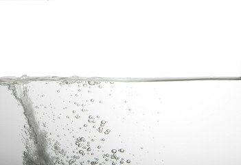 Water splash with bubbles of air, isolated on the white background.