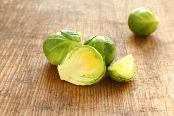 fresh brussels sprouts on a wooden board