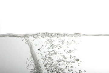 Water splash with bubbles of air, isolated on the white background.