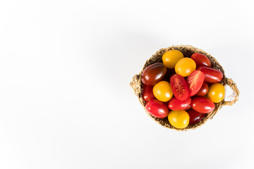 Fresh and colorful cherry tomatoes on white background