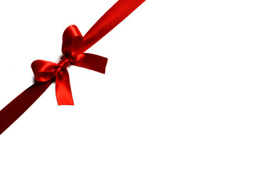 Red gift bow on white