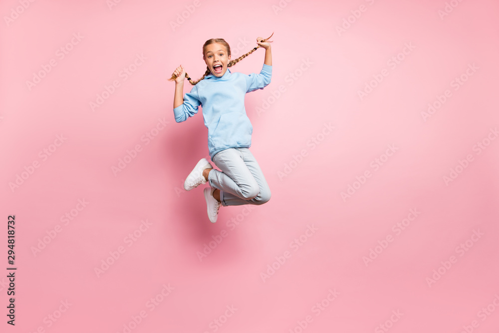 Sticker Full length body size photo of cheerful positive ecstatic overjoyed rejoicing girl jumping up wearing jeans denim blue sweatshirt sweater isolated over pastel color background