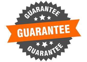 guarantee sign. guarantee orange-black circular band label