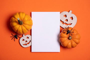 Blank white halloween card with pumpkins and spiders. Poster invitation mockup