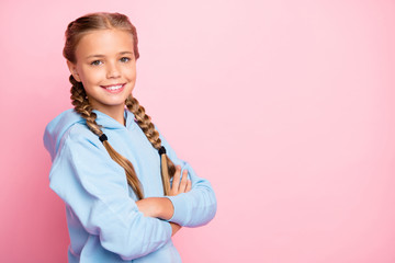 Photo of cheerful positive cute nice girl smiling toothily beaming with hands folded isolated near...