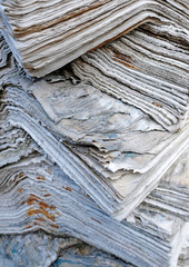 Fototapeta premium Pile of weathered old books ad newspapers