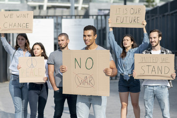 Group of people protesting together