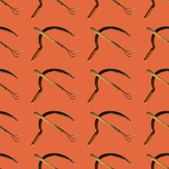 Seamless pattern with sickle,hoe on red background