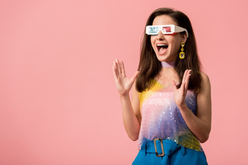 excited young stylish disco girl in 3d glasses isolated on pink