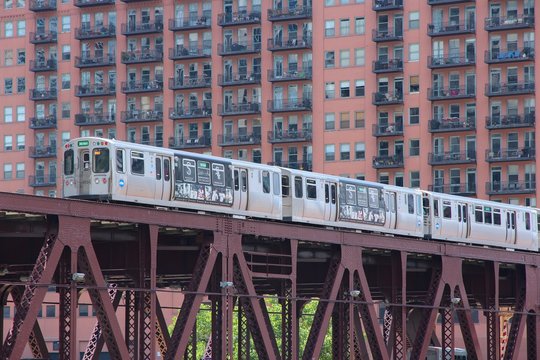 CHICAGO, USA - JUNE 28, 2013: People ride Chicago's elevated train. L train system served 231 million rides in 2012.