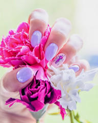 Spring manicure with insect