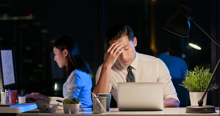 businessman overtime work