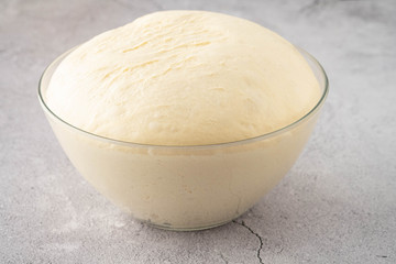 Fresh dough on the table. Copy space.