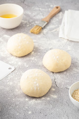 Dough pieces on the table in the kitchen. Copy space.