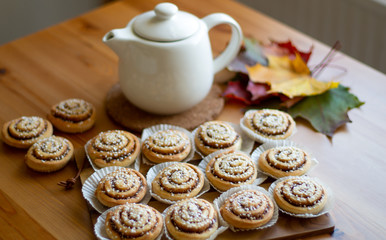 Sweet homemade cinnamon rolls with hot tasty tea