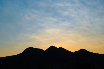 Silhouette of mountains with evening sky 