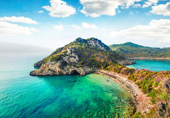 Amazing spring view of Pirates Bay, Porto Timoni, Afionas village location. Picturesque morning seascape of Ionian Sea. Fantastic outdoor scene of Corfu island, Greece, Europe.