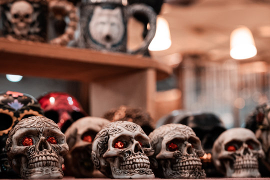 Dia de los muertos, close up of traditional decorative skulls. Mexican folklore, hispanic vibes, dark ritual and halloween themes. 