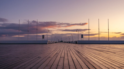 The Sopot Pier in the city of Sopot. The pier is the longest wooden pier in Europe. Beautiful sunrise. October.