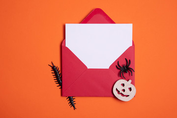Blank white halloween card with pumpkins and spiders.