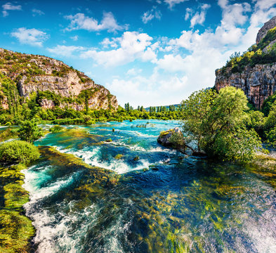 Breathtaking summer view of Krka waterfalls. Splendid morning scene of Krka National Park, Roski Slap location, Croatia, Europe. Beautiful world of Mediterranean countries.