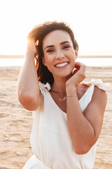 Close up of a beautiful young woman wearing summer dress