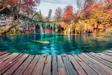 Amazing morning view of pure water waterfall in Plitvice National Park. Picturesque autumn scene of Croatia, Europe. Beauty of nature concept background.