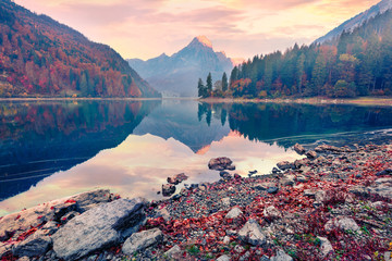 Fantastic autumn sunrise on Obersee lake, Nafels village location. Colorful morning scene of Swiss Alps, canton of Glarus in Switzerland, Europe. Beauty of nature concept background.
