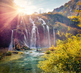 Impressive morning view of pure water waterfall in Plitvice National Park. Great autumn sunrise in Croatia, Europe. Abandoned places of Plitvice lakes series. Beauty of nature concept background.