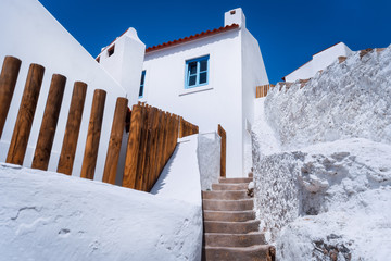 Chalk traditional house and narrow steps in beautiful, picturesque village Azenhas do Mar, Sintra Landmark, Portugal, Europe