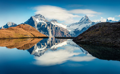 Splendid norning view of Bachalp lake / Bachalpsee, Switzerland. Fantastic autumn scene of Swiss...