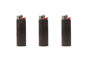 Three lighters isolated on white